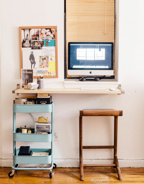 Wall mounted desk with windowsill