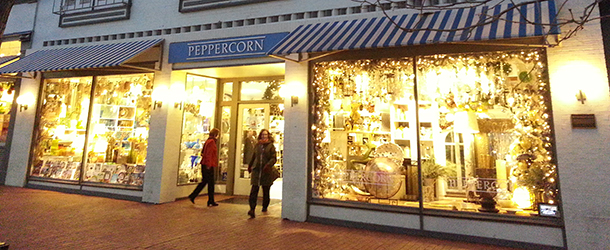 Front of Peppercorn with Lights on Pearl Street
